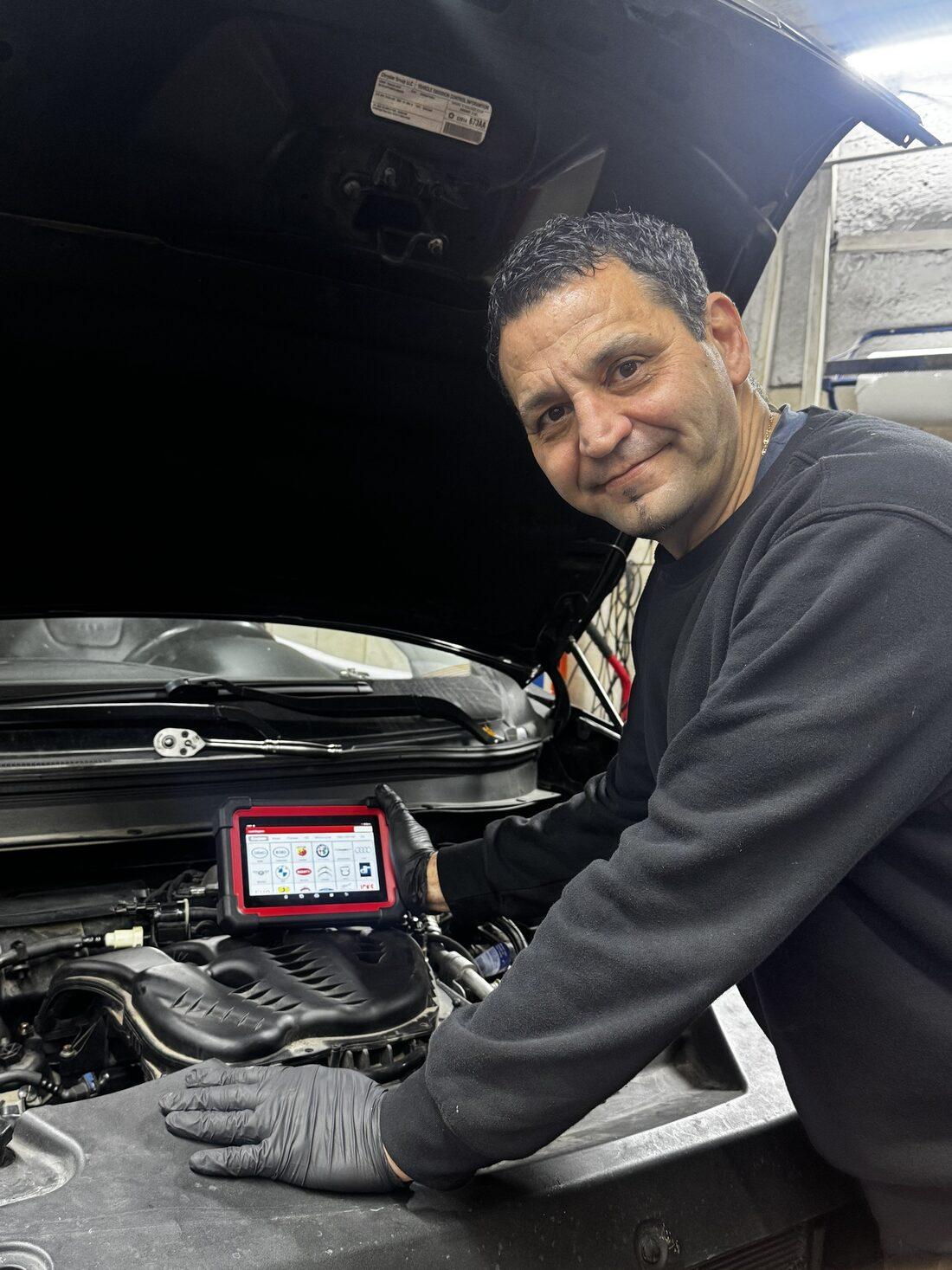 Pietro Ottaviani, English-speaking Italian mechanic at Anyfix in Vilnius